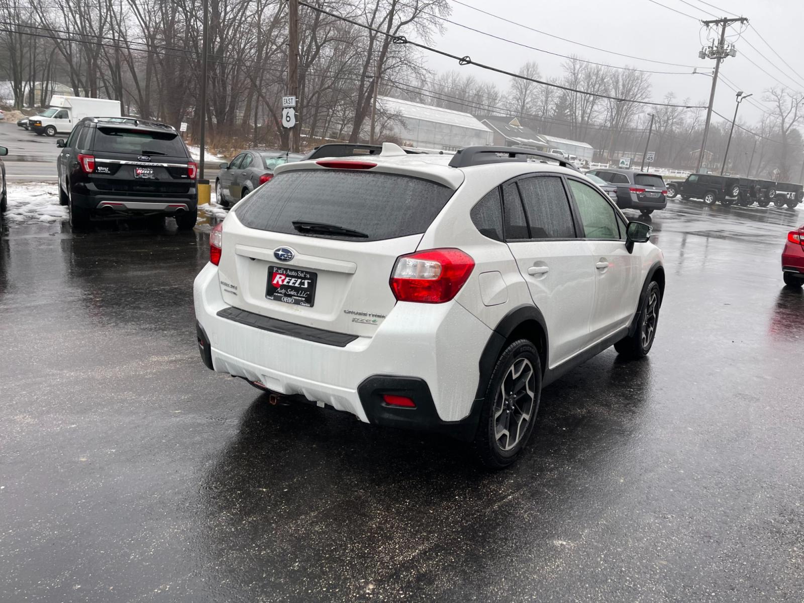 2017 White /Black Subaru Crosstrek 2.0i Limited PZEV CVT (JF2GPANC4HH) with an 2.0L I4 DOHC 16V engine, Automatic transmission, located at 11115 Chardon Rd. , Chardon, OH, 44024, (440) 214-9705, 41.580246, -81.241943 - This 2017 Subaru Crosstrek 2.0i Limited with CVT (Continuously Variable Transmission) offers a luxurious and safe driving experience. It features a leather interior, heated seats, and convenient technology such as navigation and a backup camera. A power moonroof brings a touch of the outdoors inside - Photo #5